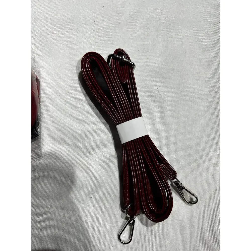 NWOT Deep Red Vegan Leather Handbag with Crossbody Strap and‎ Bag charms
